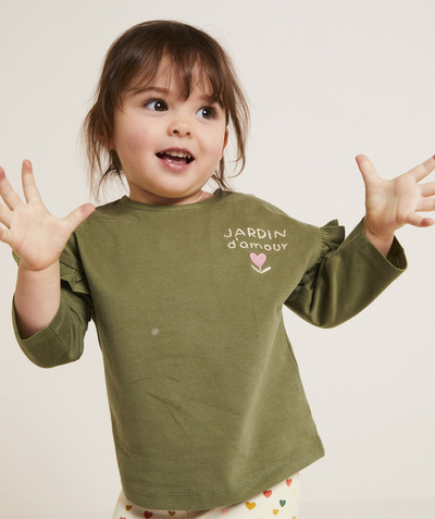 Nos tenues de la rentrée  Rayon - t-shirt bébé fille en coton bio vert avec message jardin et fleur