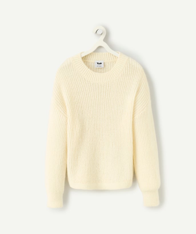   - Girl's long-sleeved cream knit sweater