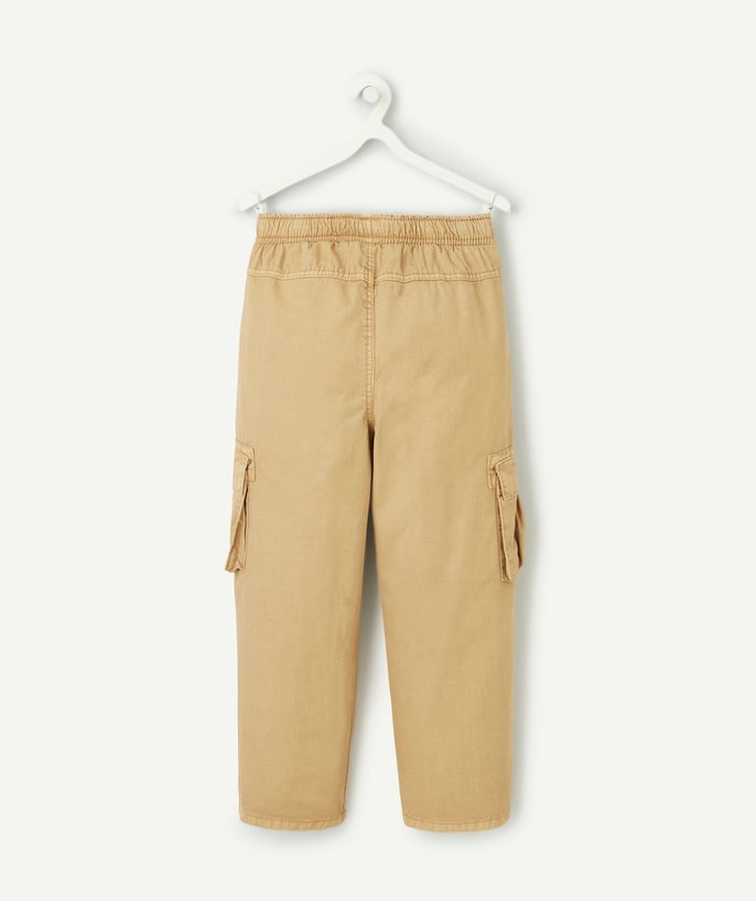   - pantalon baggy garçon en coton beige avec poches cargo