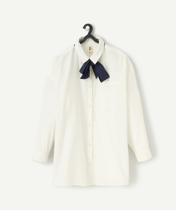   - white organic cotton girl's shirt with navy blue tie