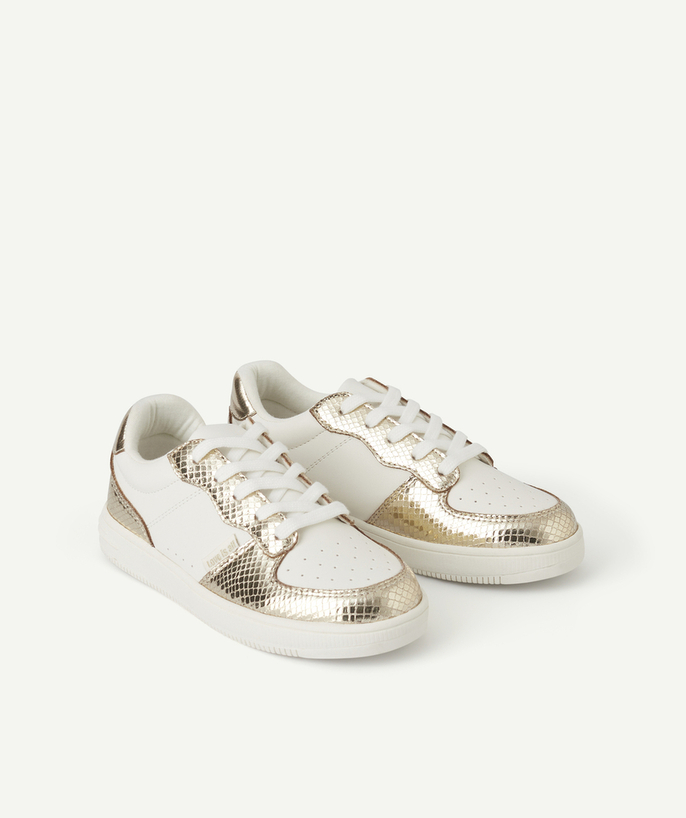   - white girl's sneakers with gold crocodile pattern