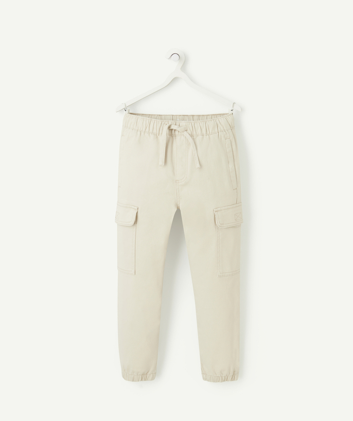   - beige boy's cargo pants with pockets