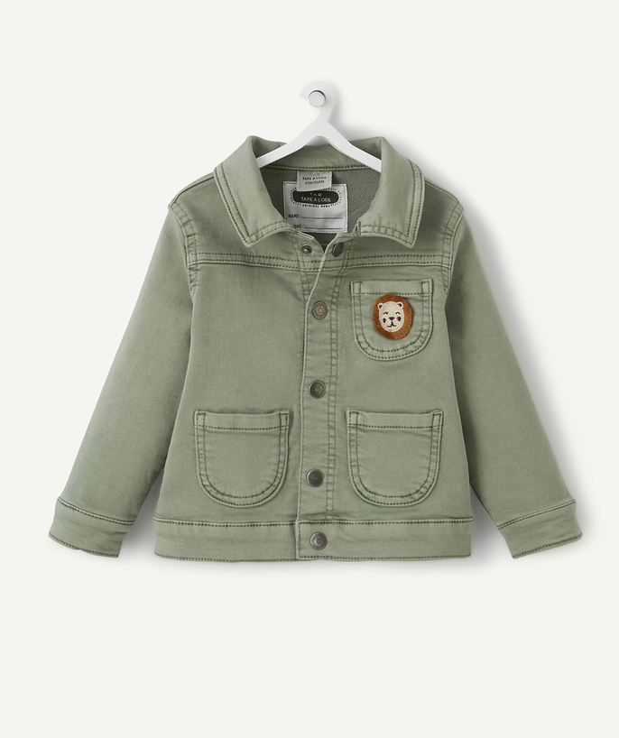   - KHAKI JACKET WITH A LION DESIGN ON THE POCKET