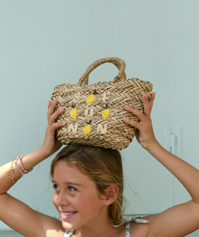   - BASKET STYLE STRAW BAG WITH A COLOURED MESSAGE