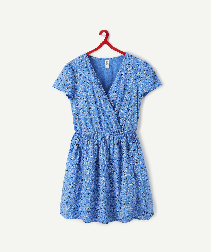   - BLUE DRESS WITH A FLOWER PRINT